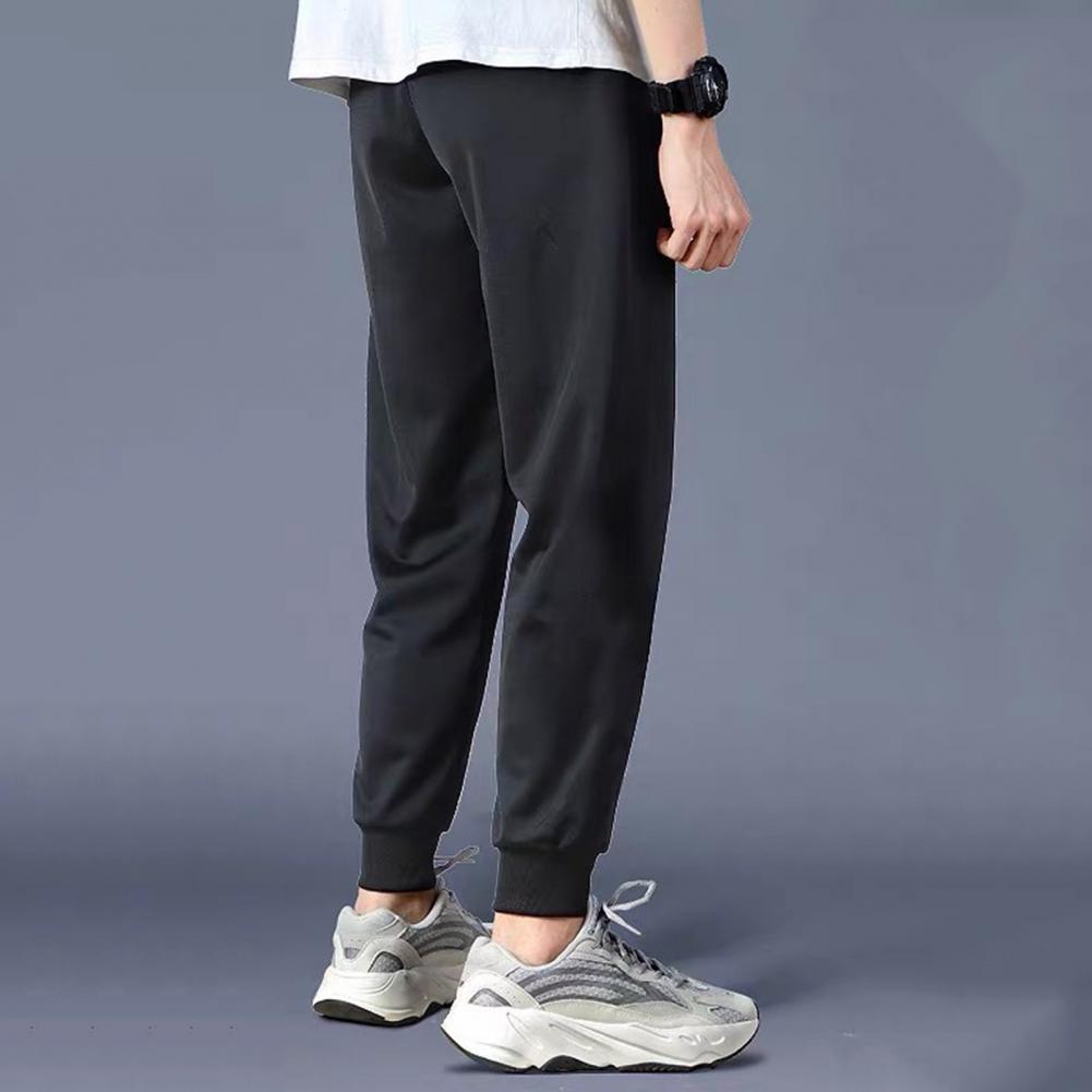 Men Pants waist drawstring ankle tied pants Slim pockets Stretchy Polyester Fiber Waist Drawstring Trousers for Daily Wear 2021